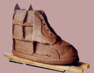 Side view of clay shoe