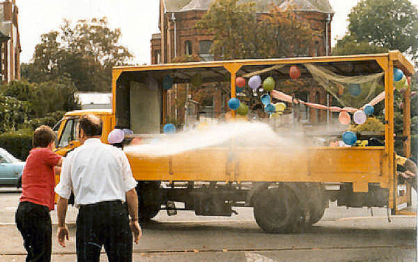 Fire hose in use on lorry